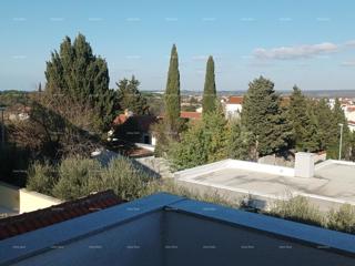 Pula Štinjan. Prodamo 2 stanovanji v 1. nadstropju s pripadajočim vrtom.
