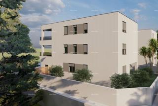 Trosobno stanovanje v 1. nadstropju novogradnje v bližini morja