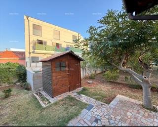 Na prodaj: Apartma v Novigradu z velikim vrtom.