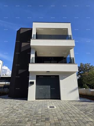 Trosobno stanovanje v 1. nadstropju novogradnje v bližini morja