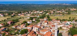 Zazidljiva parcela v centru vasi, Labinci