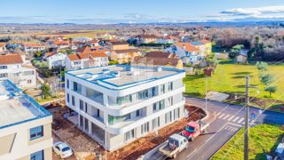 Umag, okolica! Moderno stanovanje s pogledom na morje v gradnji!