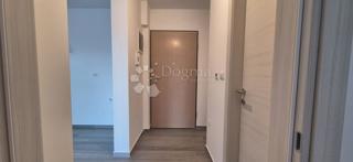 Dvosobno stanovanje v novogradnji 1 km od morja, površina 54,47 m2