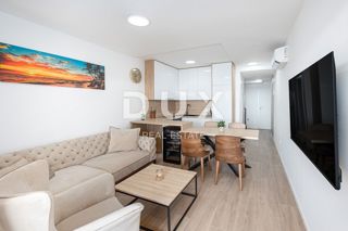 OTOK PAG, POVLJANA - Dvonadstropno stanovanje 83m2, 1. vrsta do morja