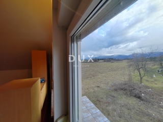 GOSPIĆ - Samostojna hiša s prostornim vrtom in obdelovalnim zemljiščem