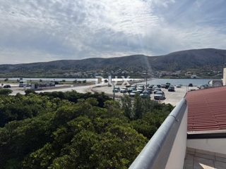 OTOK PAG, PAG - apartmajska hiša z restavracijo