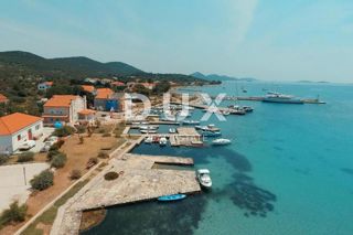 OTOK IST - Gradbeno zemljišče z zasebno cesto do plaže! Mir, tišina, narava...!