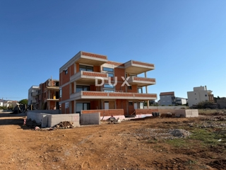 OTOK PAG, POVLJANA - Dvosobno stanovanje z vrtom v novogradnji