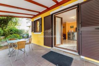 Prostorno stanovanje v pritličju z urejenim vrtom