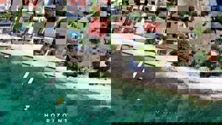 Hiša v prvem vrsti ob morju in plaži