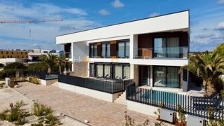 Luksuzna investicijska nepremičnina v medulinu, 3 hiše+čoln