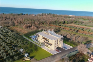 Istra, območje Umaga - stanovanje 82m2, novogradnja 500m od morja