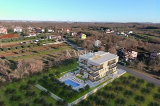 Istra, območje Umaga - stanovanje 82m2, novogradnja 500m od morja
