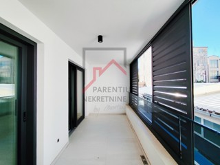 Istra, center Poreča - moderno dvosobno stanovanje z garažo v urbani novogradnji