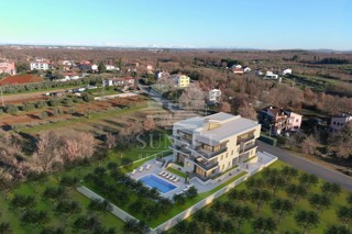 UMAG – STANOVANJE V MODERNI STAVBI V DRUGEM NADSTROPJU S POGLEDOM NA MORJE
