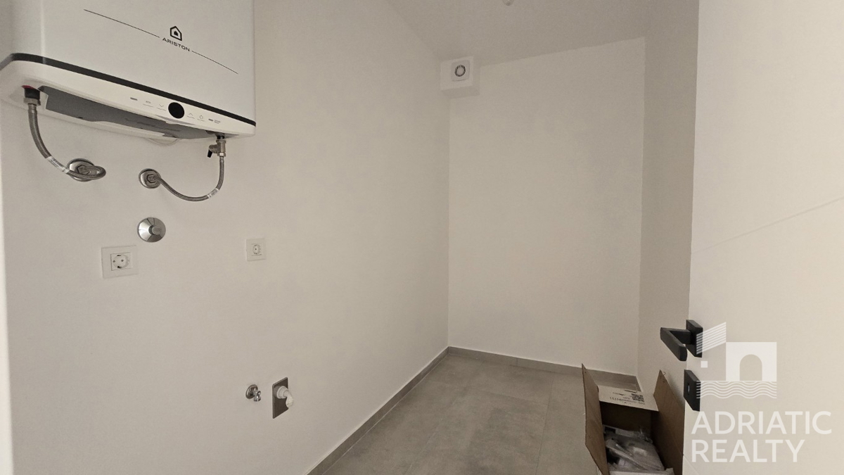 Tribunj, prostoren dvosobni stan v pritličju s svojim vrtom 121,55 m2