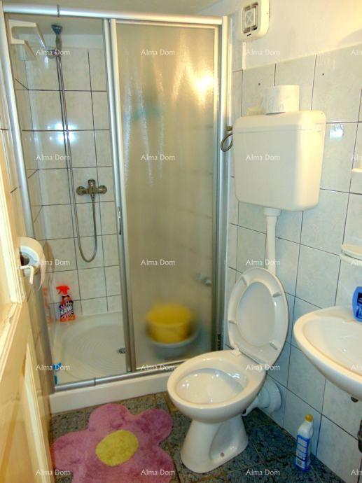 Prostrana hiša v Marčani s tremi nadstropji in vrtom - prodaja.