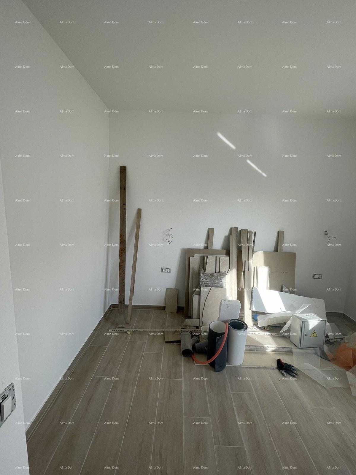 Prodaja hiše s tremi stanovi v Medulinu