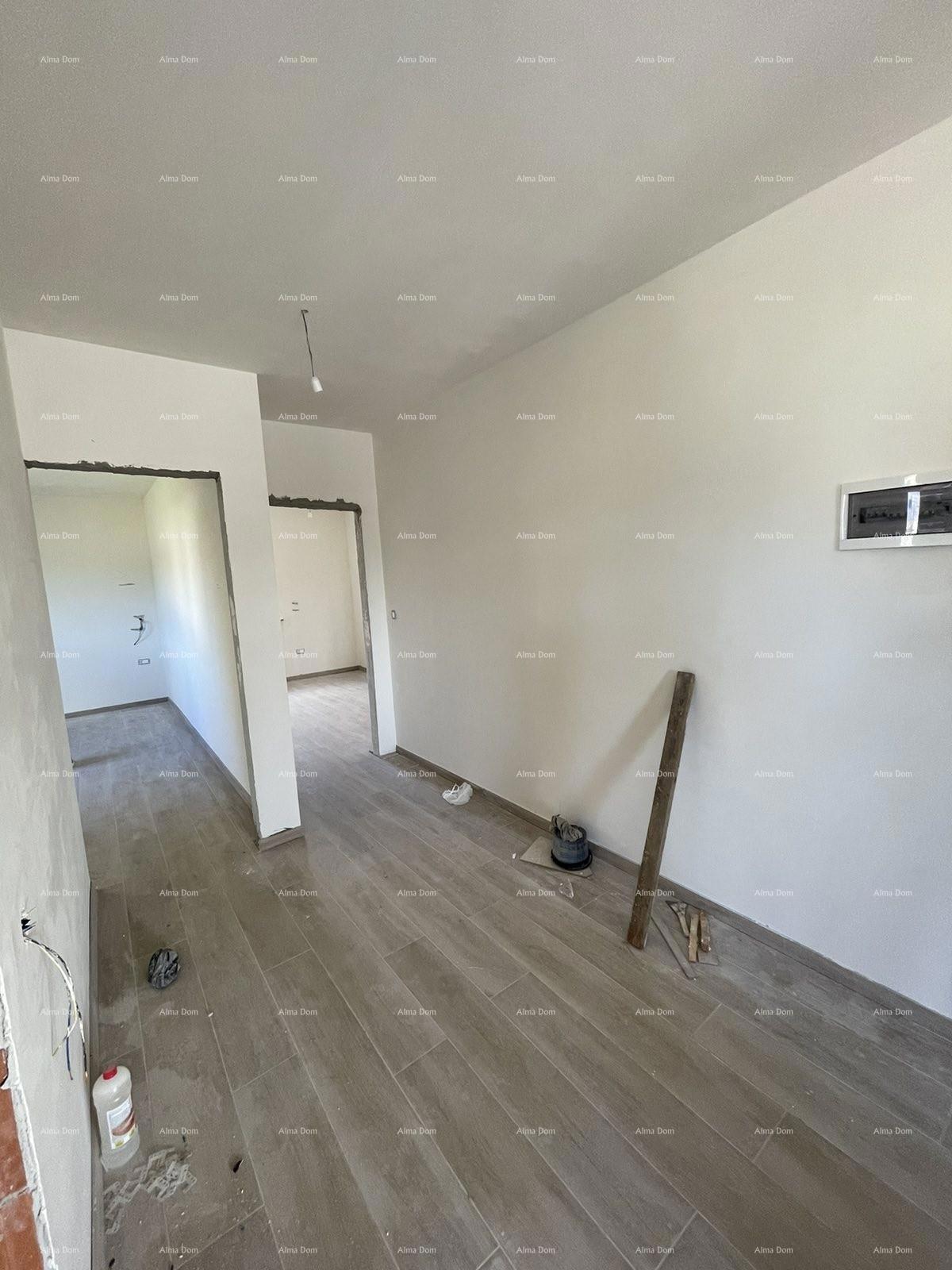 Prodaja hiše s tremi stanovi v Medulinu