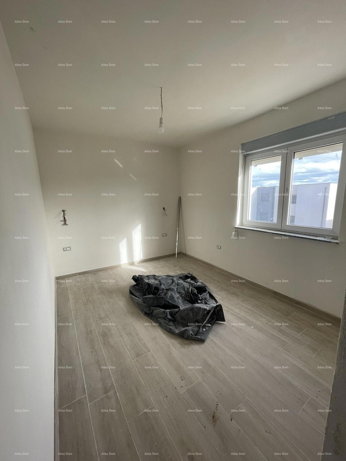 Prodaja hiše s tremi stanovi v Medulinu