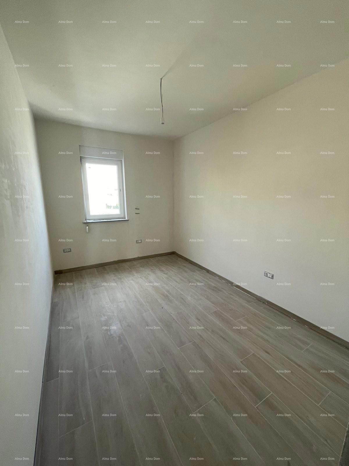 Prodaja hiše s tremi stanovi v Medulinu