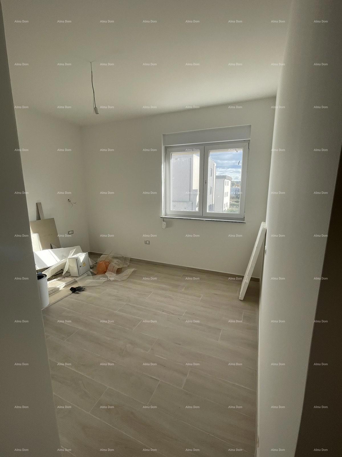 Prodaja hiše s tremi stanovi v Medulinu