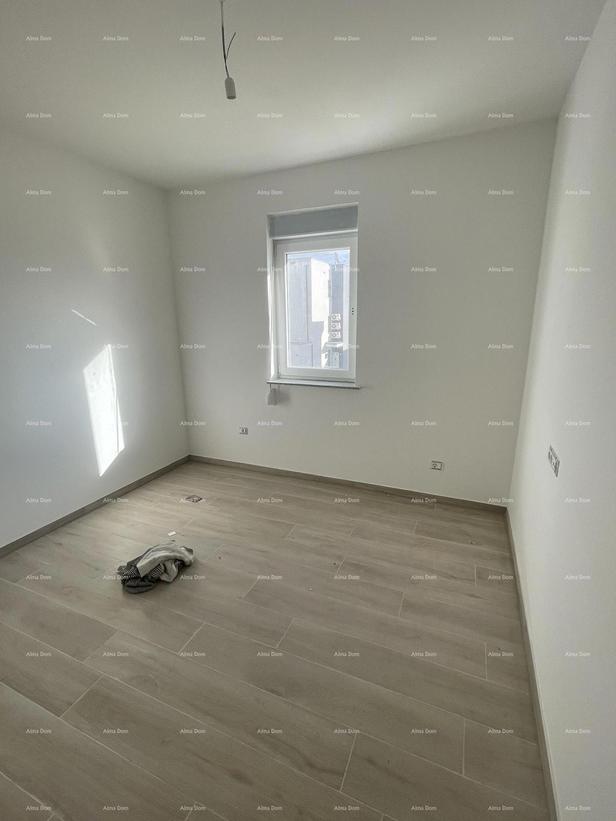 Prodaja hiše s tremi stanovi v Medulinu