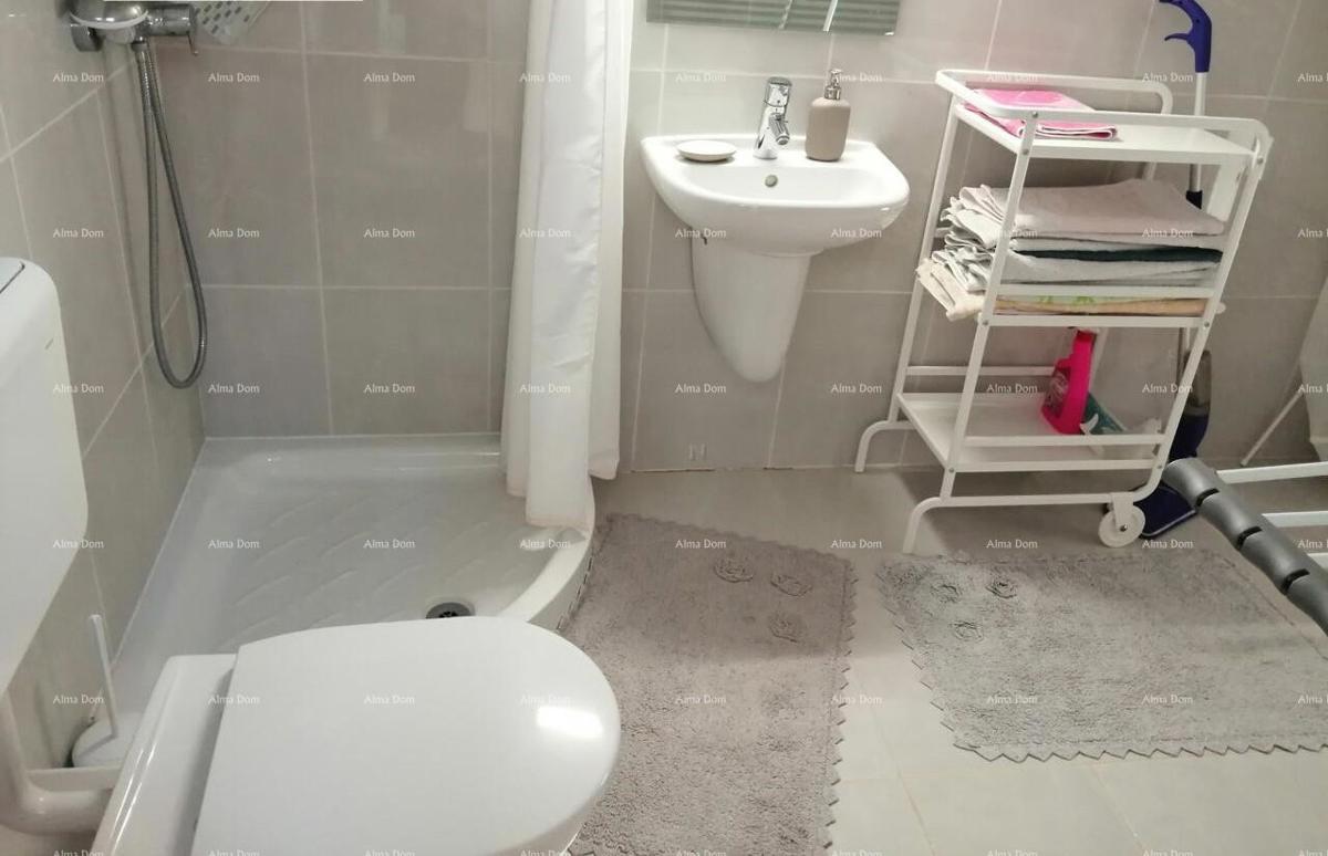 V Zambratiji, Umag, se prodaja apartma s pogledom na morje