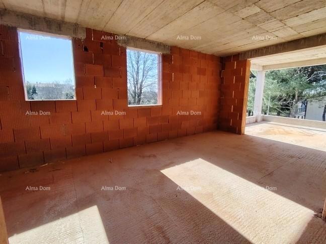 Trosobno stanovanje v 1. nadstropju novogradnje v bližini morja
