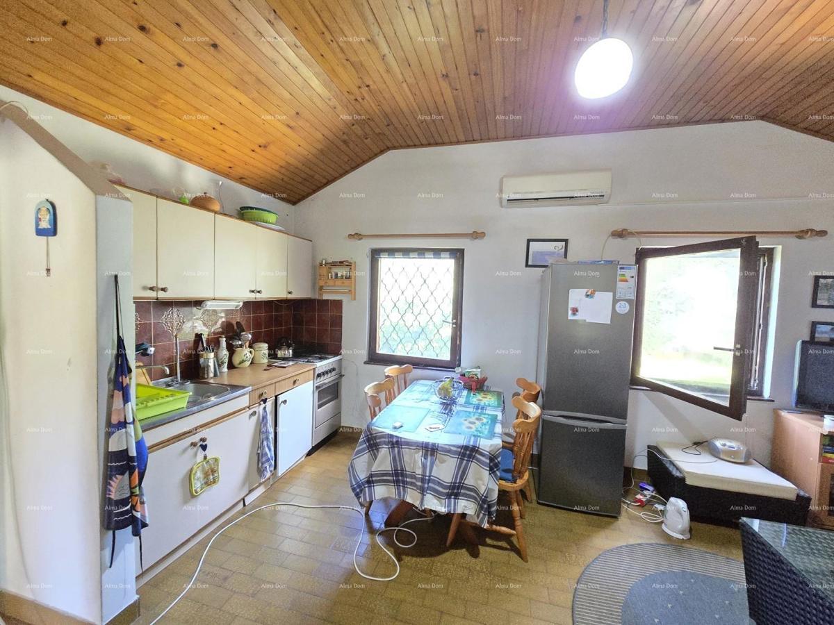 Idilična vikendica v Peroju, blizu morja – popoln kraj za pobeg od mestnega vrveža!