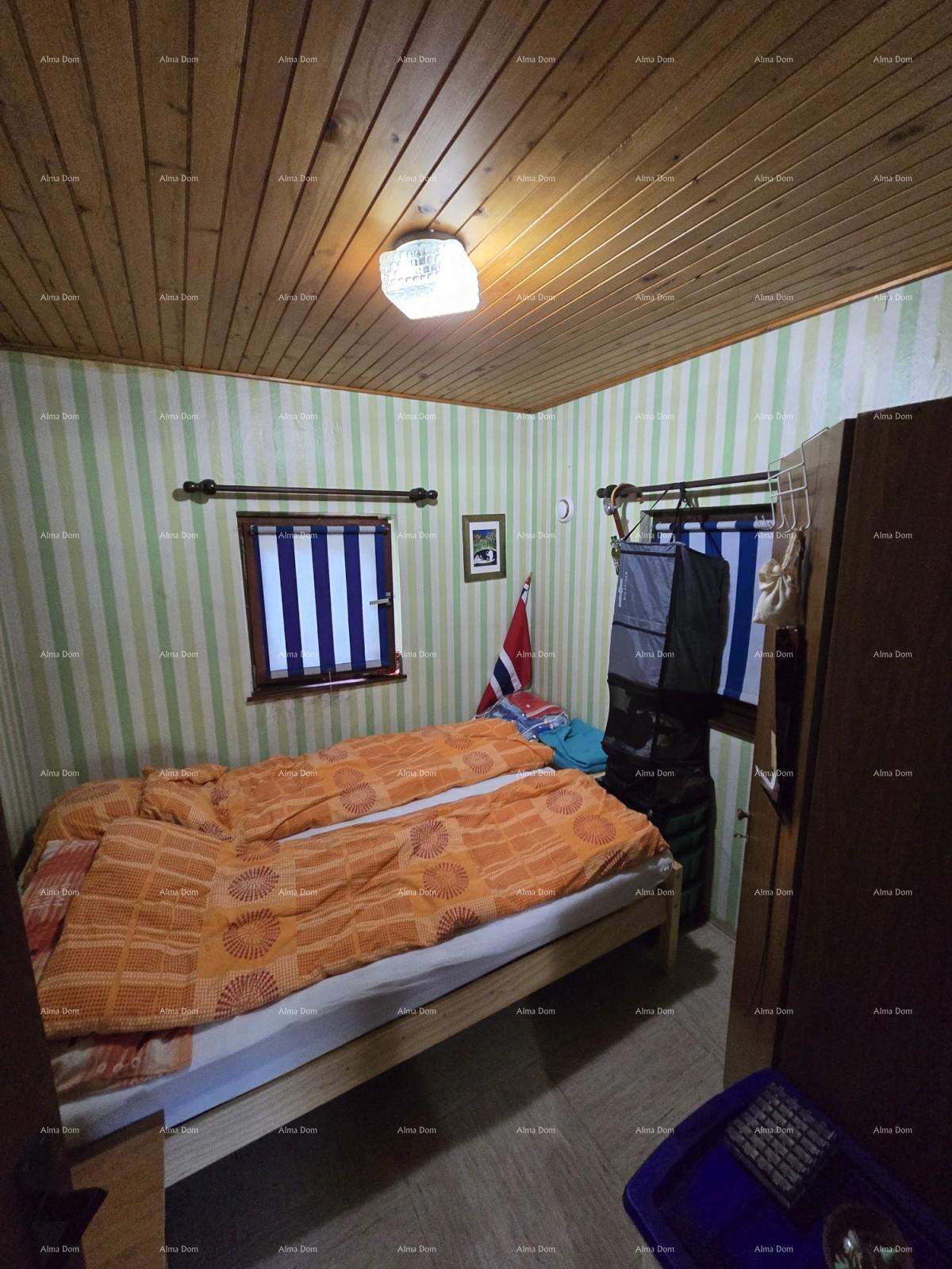 Idilična vikendica v Peroju, blizu morja – popoln kraj za pobeg od mestnega vrveža!