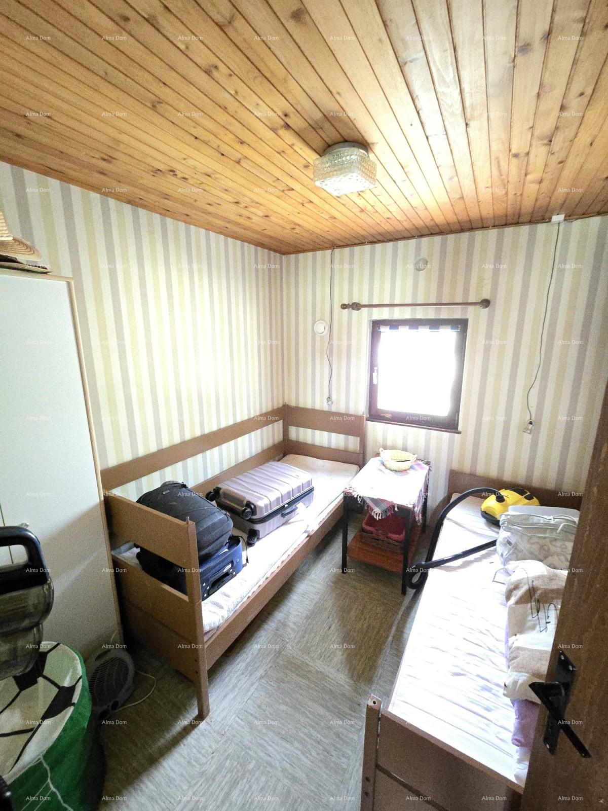 Idilična vikendica v Peroju, blizu morja – popoln kraj za pobeg od mestnega vrveža!