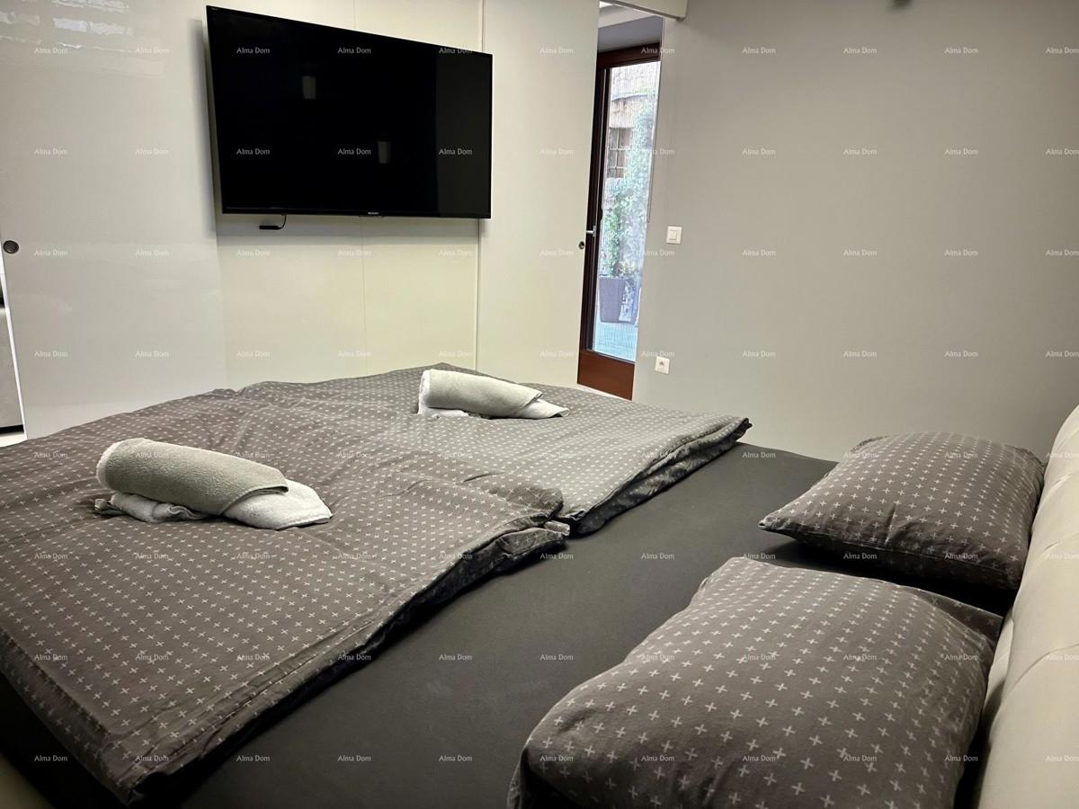 Čudovita hiša s tremi etažiranimi apartmaji v starem mestnem jedru Poreča!