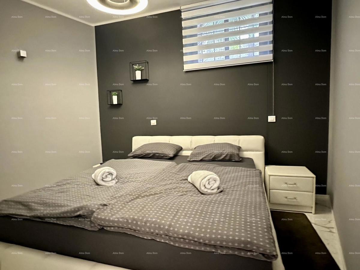 Čudovita hiša s tremi etažiranimi apartmaji v starem mestnem jedru Poreča!