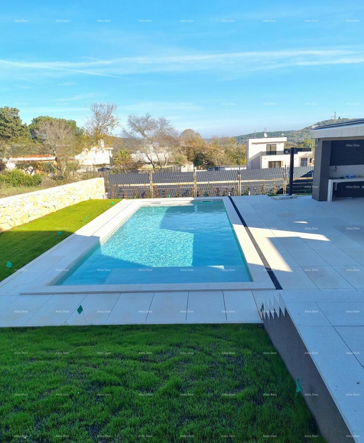 Na prodaj je moderna hiša s bazenom, ki se nahaja v idilični vasici blizu Rovinja.