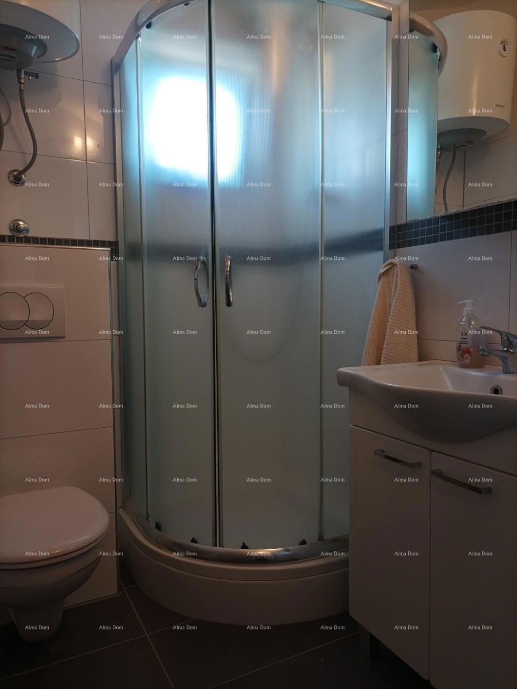 Pula Štinjan. Prodamo 2 stanovanji v 1. nadstropju s pripadajočim vrtom.