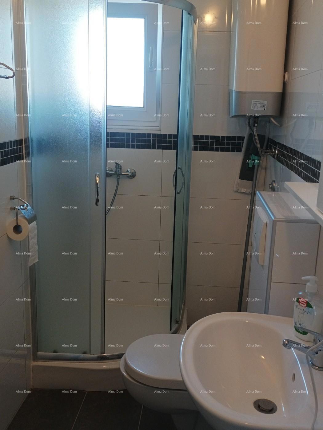 Pula Štinjan. Prodamo 2 stanovanji v 1. nadstropju s pripadajočim vrtom.
