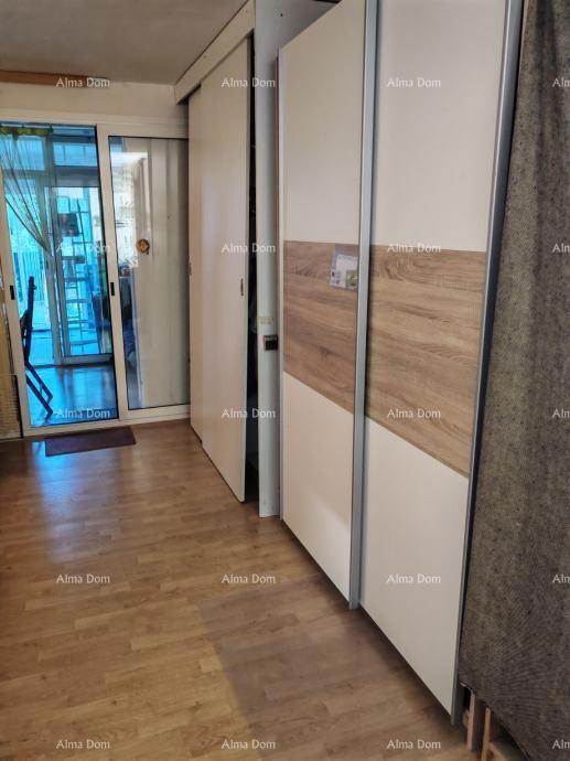 Opremljeno stanovanje z vrtom!