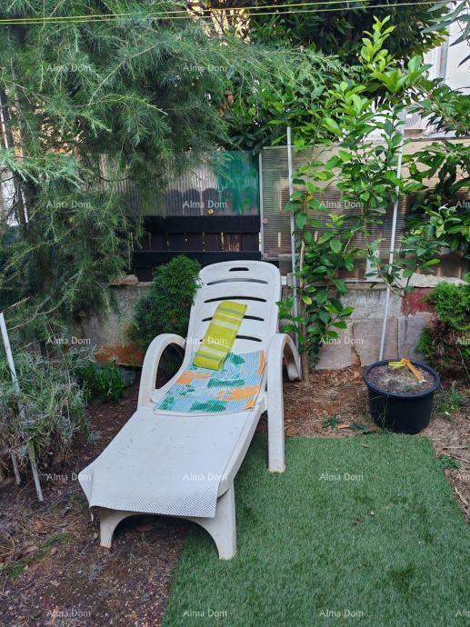 Opremljeno stanovanje z vrtom!