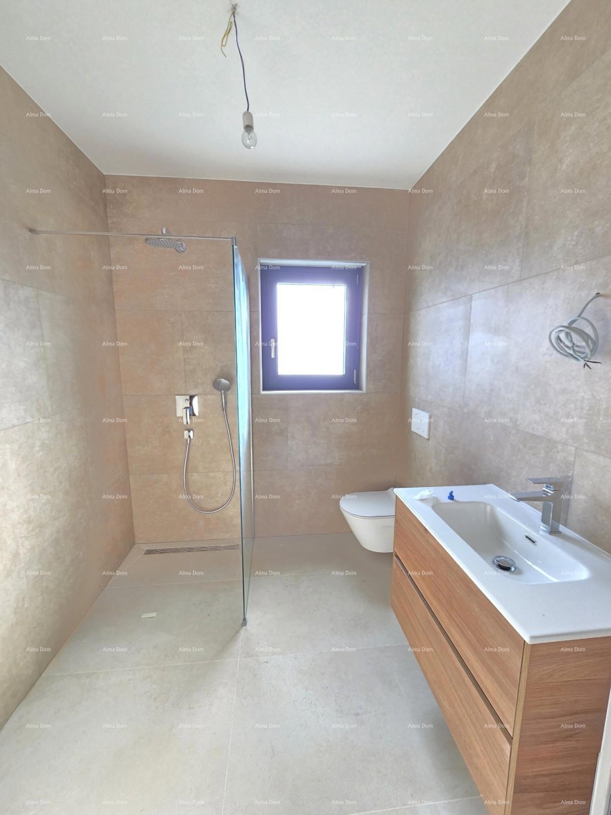 Penthouse v novi stavbi v bližini morja