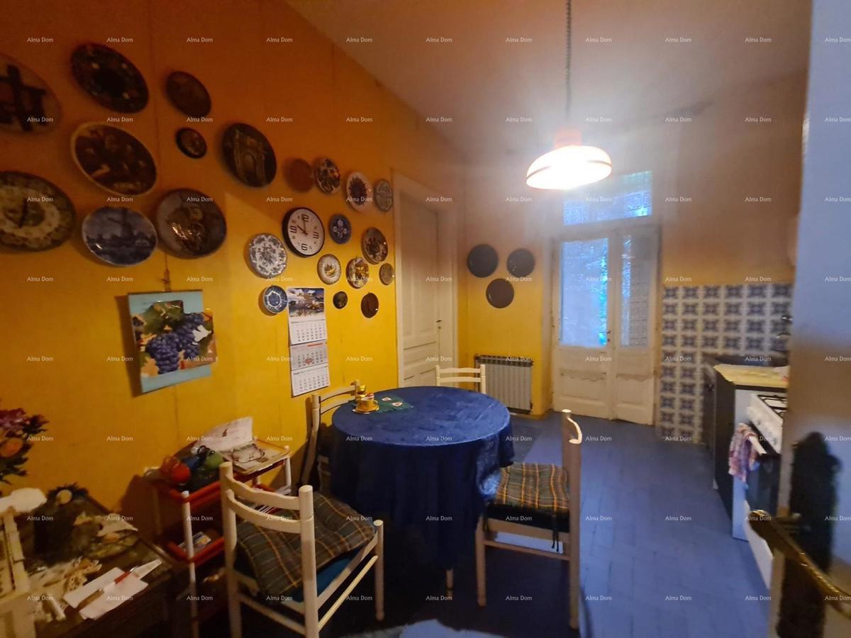 Stan v pritličju s dvoriščem in garažo – center Pule