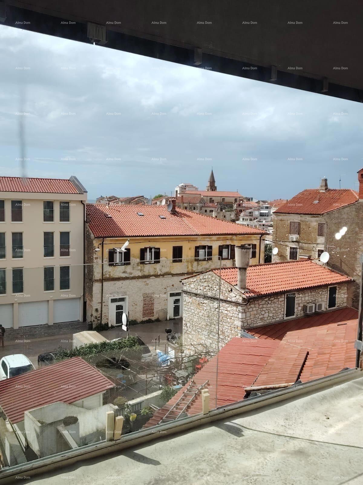 Prodamo stanovanja v stanovanjsko poslovni stavbi s pogledom na morje, center Umaga!