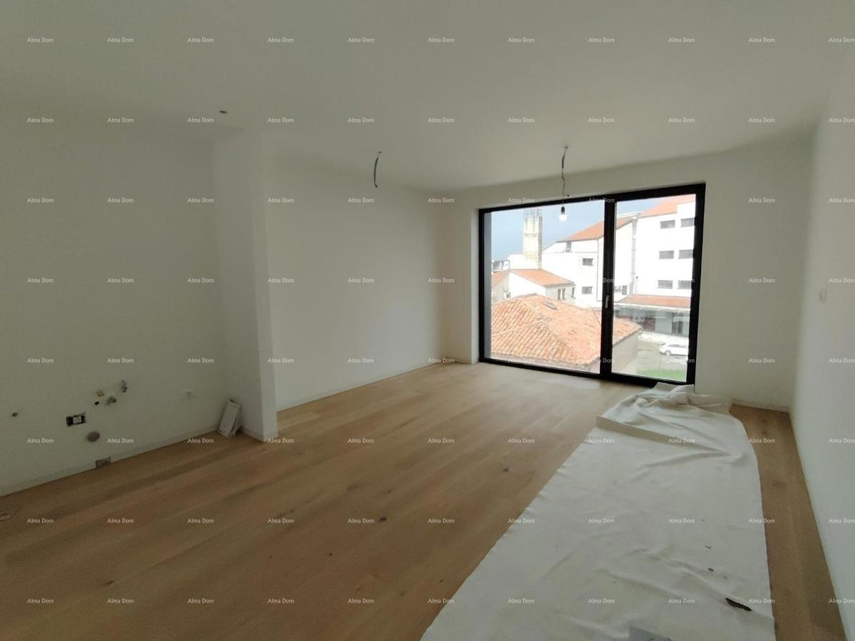 Prodamo stanovanja v stanovanjsko poslovni stavbi s pogledom na morje, center Umaga!