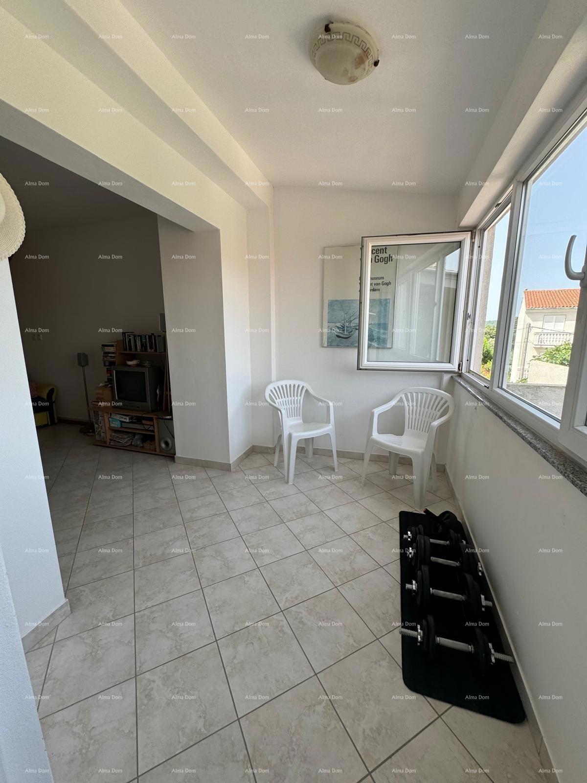 Hiša s pomožnim objektom. Medulin.