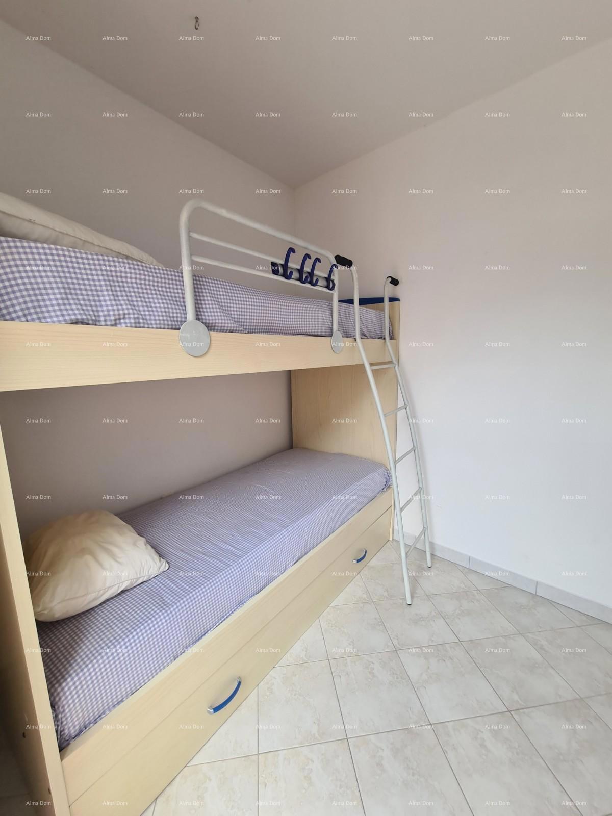 Hiša s pomožnim objektom. Medulin.