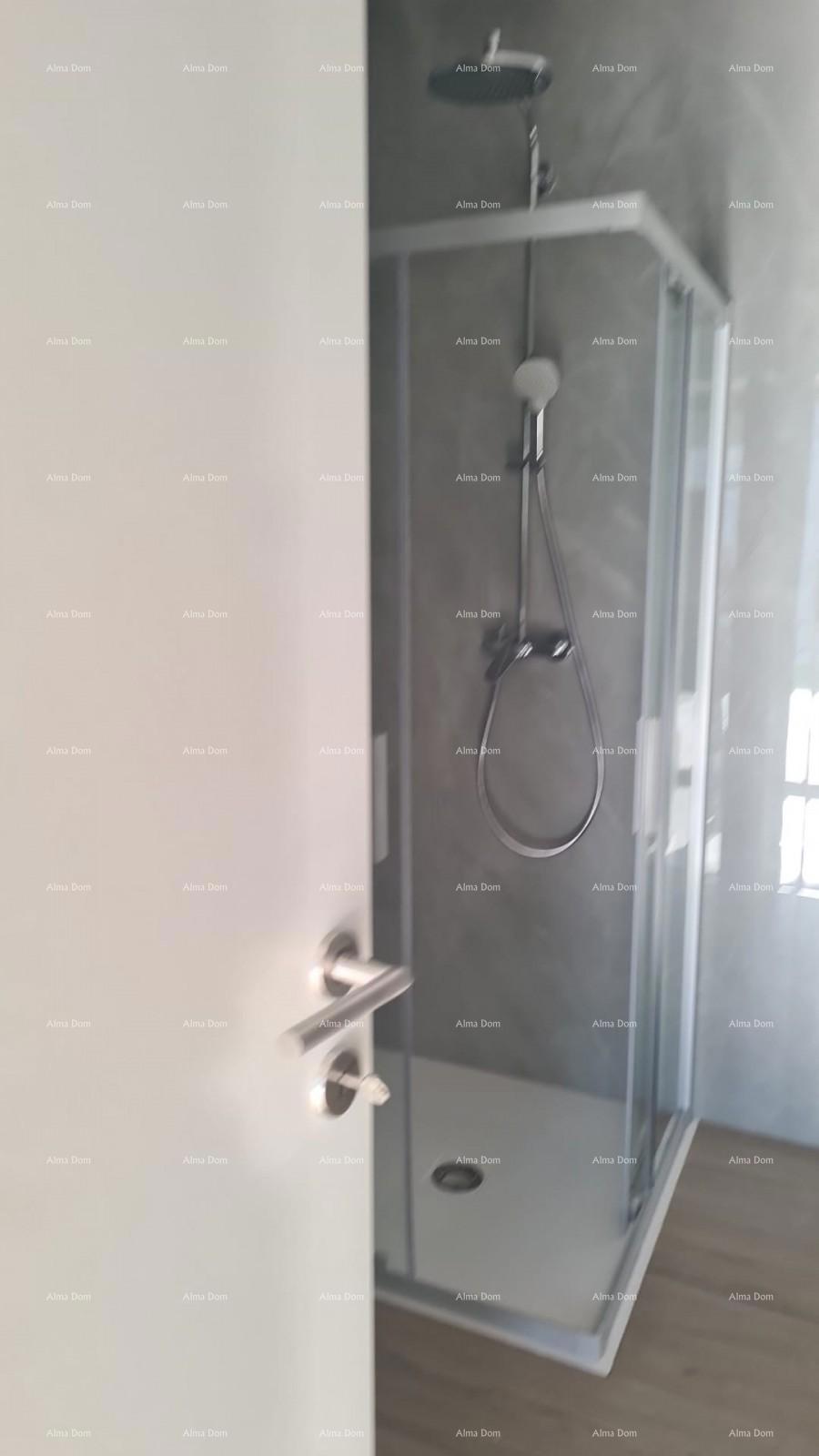 Moderen apartma v bloku A z vrtom in parkirnim mestom, blizu Umaga!