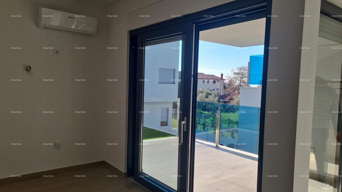 Moderen apartma v bloku A z vrtom in parkirnim mestom, blizu Umaga!