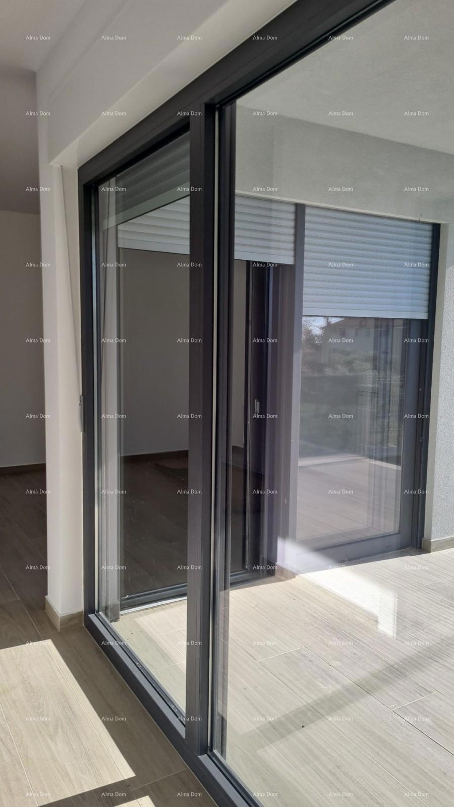 Moderen apartma v bloku A z vrtom in parkirnim mestom, blizu Umaga!