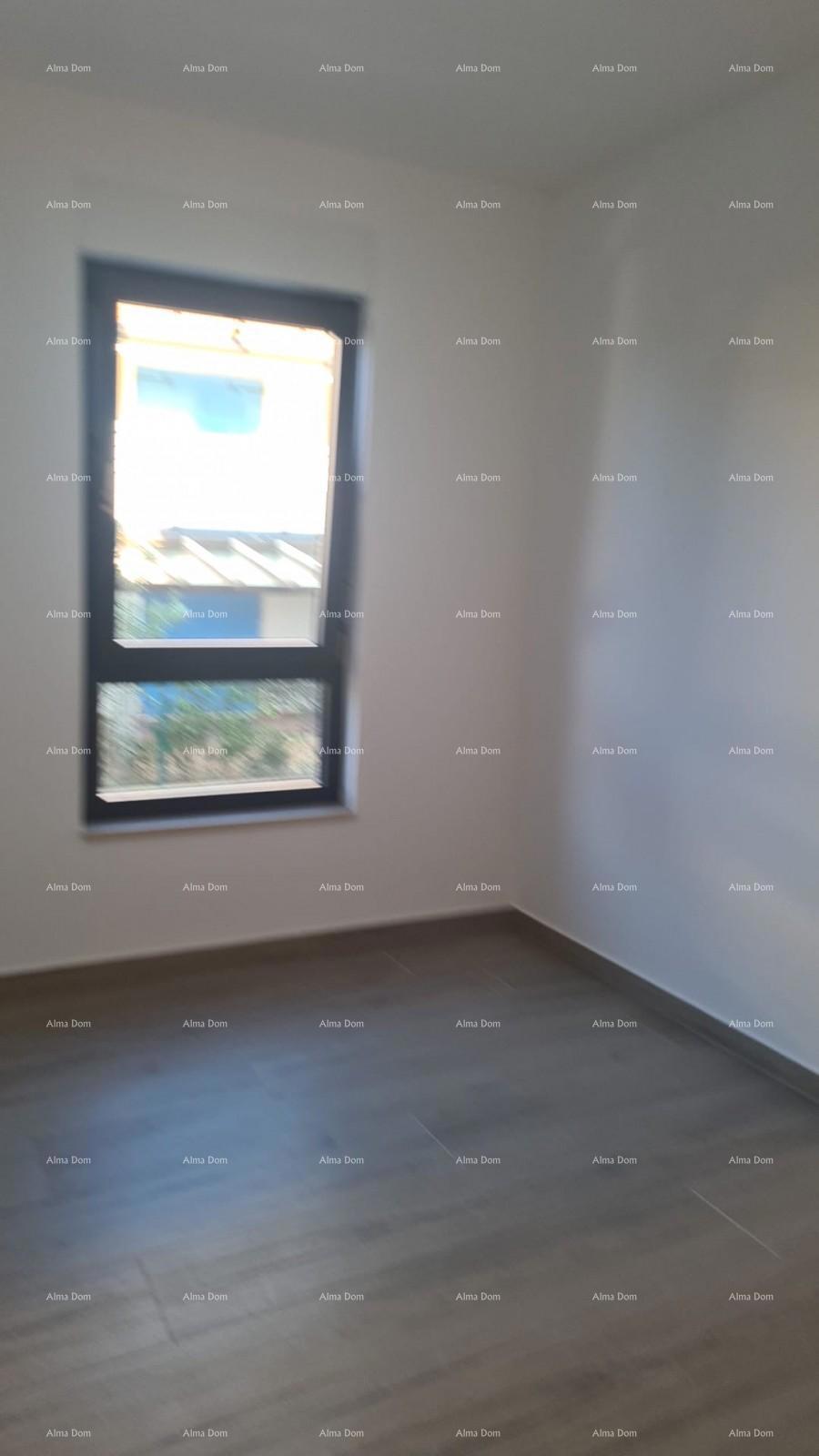 Moderen apartma v bloku A z vrtom in parkirnim mestom, blizu Umaga!