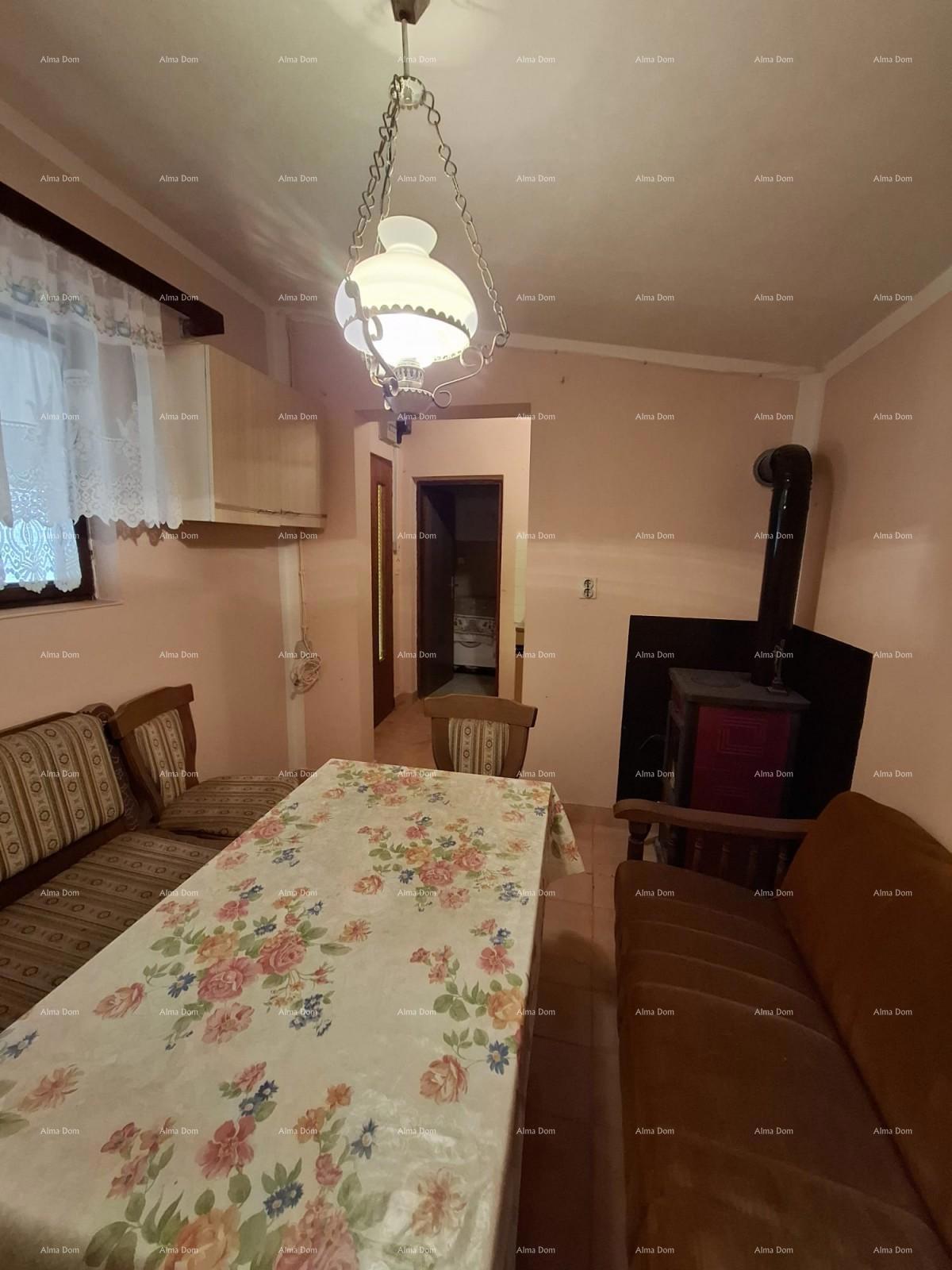 Na prodaju – Hiša in zemljišče z manjšo hišico v Cokunih